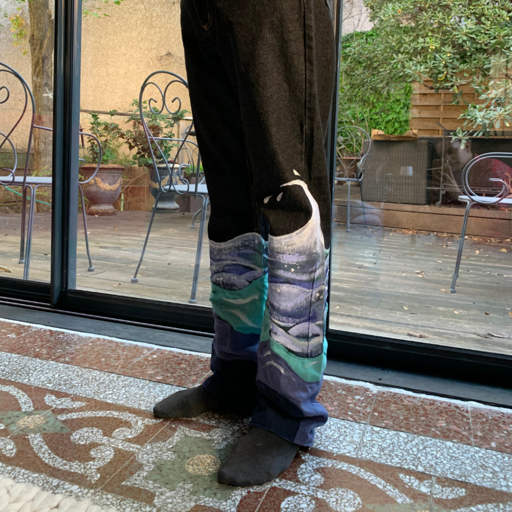 Personnage imaginaire illustré à l’aquarelle dans un univers magique